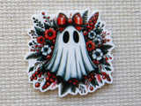 First view of a ghost minder with a red bow.