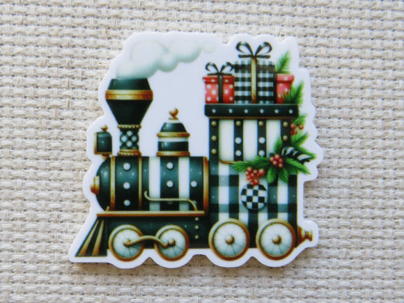 Decorative minder of a vintage train with Christmas-themed elements on a textured beige background