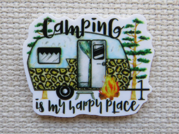 Minder with a camper and 'Camping is my happy place' text on a textured background