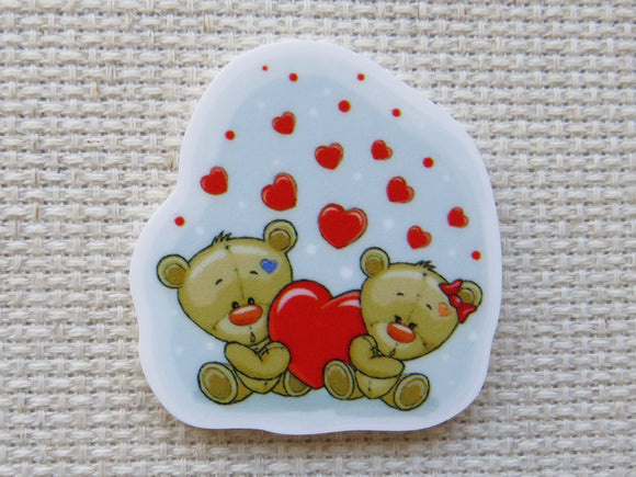 First view of a pair of bears and hearts minder.