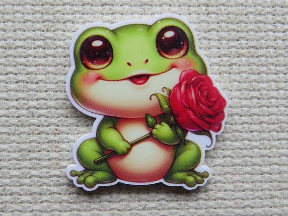 Cartoon frog holding a red rose minder on a textured beige background