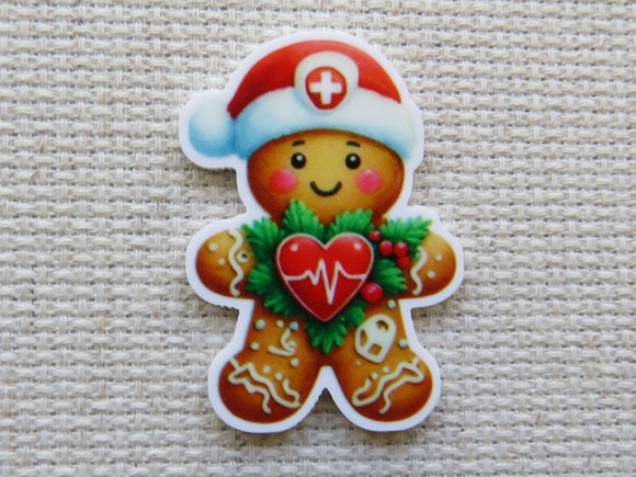 Gingerbread man minder wearing a nurse's hat on a textured beige background