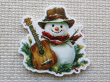 Minder of a snowman holding a guitar on a textured beige background