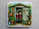 Minder with cartoon turkeys in front of a garden shed on a textured surface