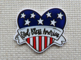 Heart-shaped patriotic minder with 'God Bless America' text on a textured background