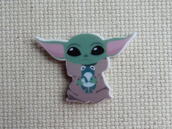First view of Grogu with a Frog Needle Minder.