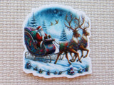 Minder of Santa Claus in a sleigh pulled by reindeer against a snowy landscape.