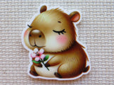 Cartoon capybara minder holding a flower on a textured beige background
