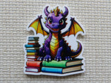 Colorful dragon minder on a textured surface
