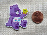 Second view of purple care bear minder.