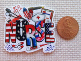 Minder with 'NURSE' text and medical symbols next to a penny for size comparison