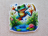 Colorful frog minder on a textured beige background