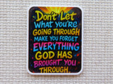 Colorful motivational minder with text on a textured surface