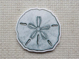 First view of Silver Sand Dollar Needle Minder.