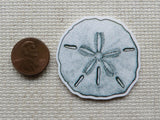 Second view of Silver Sand Dollar Needle Minder.