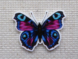 First view of Blue, Pink and Purple Butterfly Needle Minder.