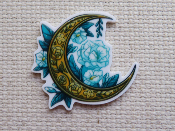 First view of Celtic Moon with Blue Flowers Needle Minder.