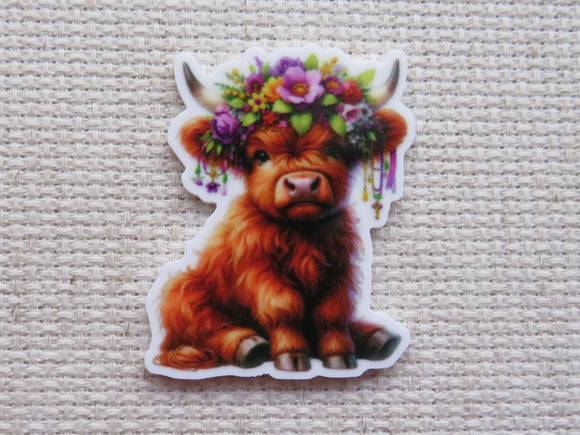 First view of Sitting Cow Needle Minder.