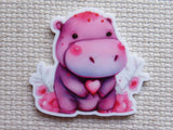 First view of  a pink hippo minder.