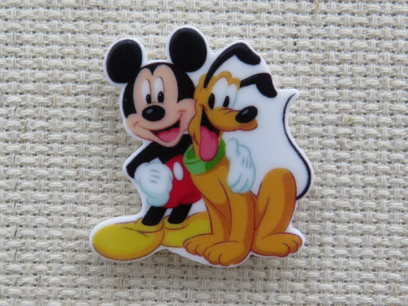 First view of Mickey and Pluto Needle Minder.