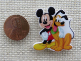 Second view of Mickey and Pluto Needle Minder.