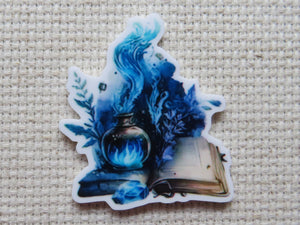 First view of Blue Spell Book Needle Minder.