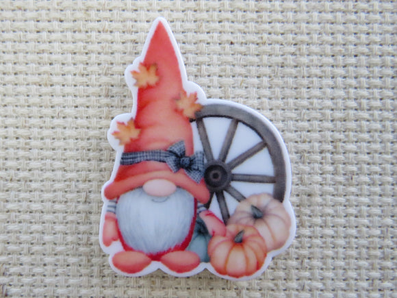 First view of Autumn Gnome with a Wagon Wheel Needle Minder.