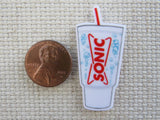 Second view of Fast Food Beverage Container Needle Minder.