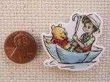 Second view of Christopher Robin and Pooh Bear Floating in an Umbrella Needle Minder.