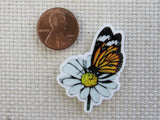 Second view of Monarch Butterfly on a White Flower Needle Minder.