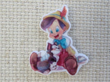First view of Pinocchio is Sittng with Figaro Needle Minder.