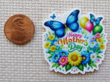Colorful 'Happy Mother's Day' minder with butterflies and flowers on a textured surface.