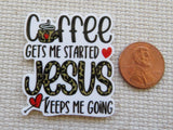 Minder with 'Coffee gets me started, Jesus keeps me going' text next to a penny for size comparison.