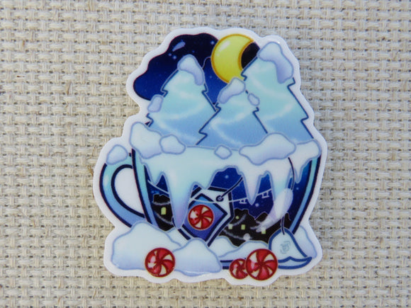First view of snowy teacup needle minder.