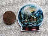 Second view of Mountain Home in a Snow Globe Needle Minder.