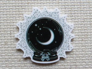 First view of Moon in a Crystal Ball Needle Minder.