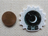 Second view of Moon in a Crystal Ball Needle Minder.