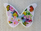 First view of Butterflies within a Pink Butterfly Needle Minder.