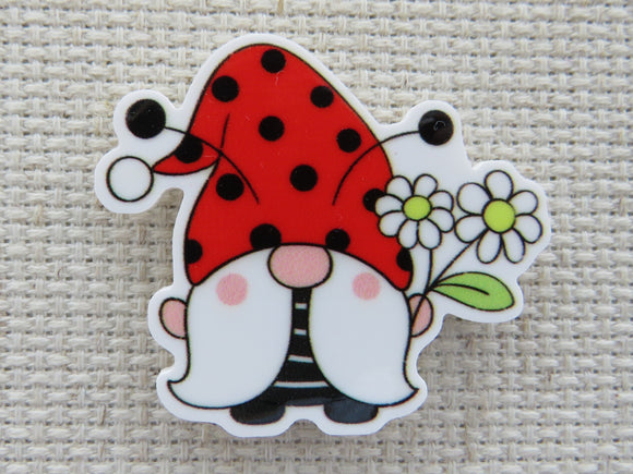 First view of Ladybug Gnome with White Flowers Needle Minder.