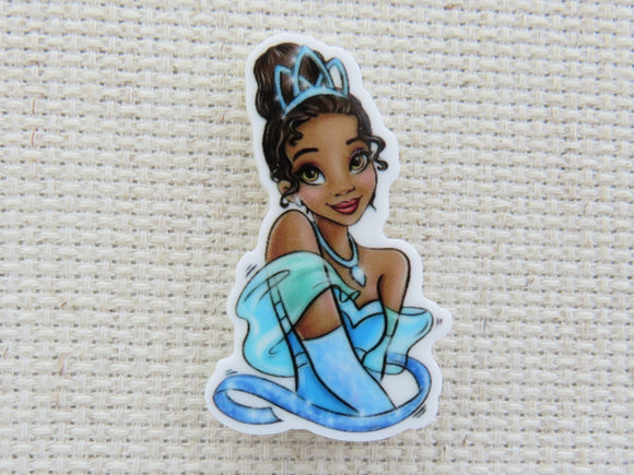 First view of Tiana Dressed in Blue Needle Minder.