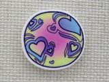 First view of Heart Crater Planet Needle Minder,.