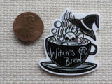 Second view of Witch's Brew Teacup Needle Minder.