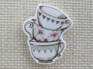 First view of A Stack of White Teacups Needle Minder.