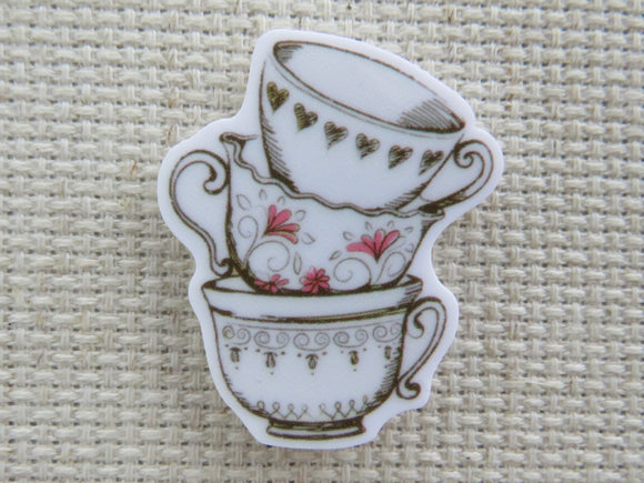 First view of A Stack of White Teacups Needle Minder.