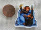 Second view of Chimps Playing in Pockets Needle Minder.