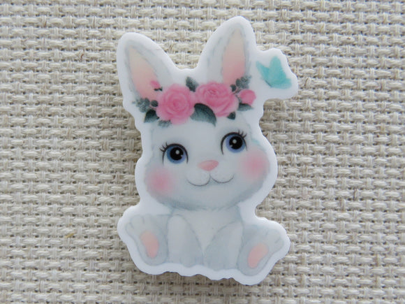 First view of Sitting Bunny with a Floral Crown Needle Minder.