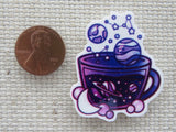 Second view of The Other Purple Planetary Teacup Needle Minder.