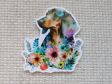 Minder of a dachshund with floral design on a textured beige background