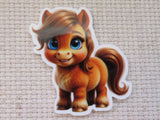 A minder featuring a cute cartoon pony with brown hair, blue eyes, and a brown tail, shown on a textured beige fabric background.