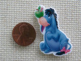 Second view of Eeyore is Looking at an Apple on his Nose Needle Minder.